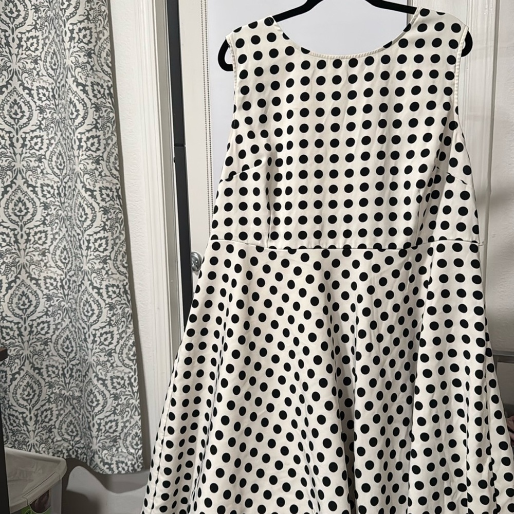 White with black polka dots